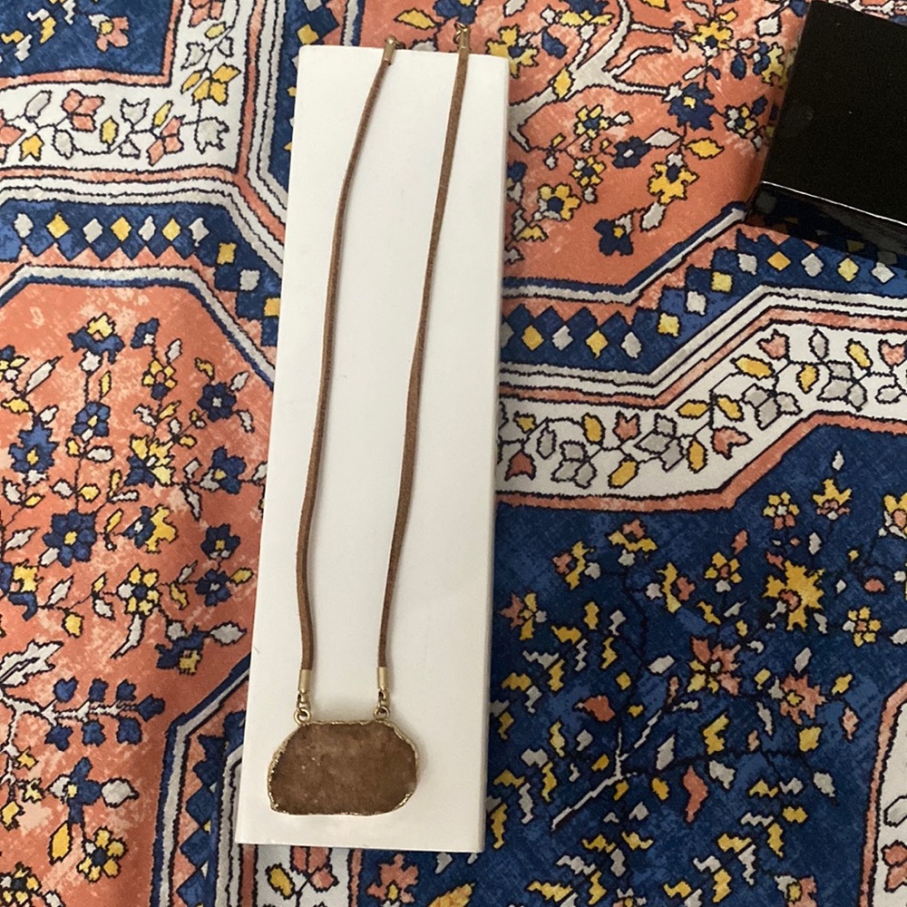 18” suede necklace with stone pendent Necklace can adjust to be smaller.